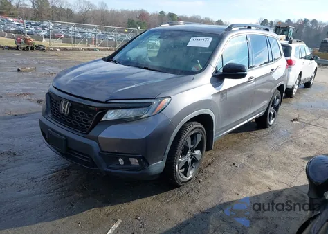 2021 Honda Passport Awd Elite z USA, uszkodzony, nr VIN 5FNYF8H01MB012279